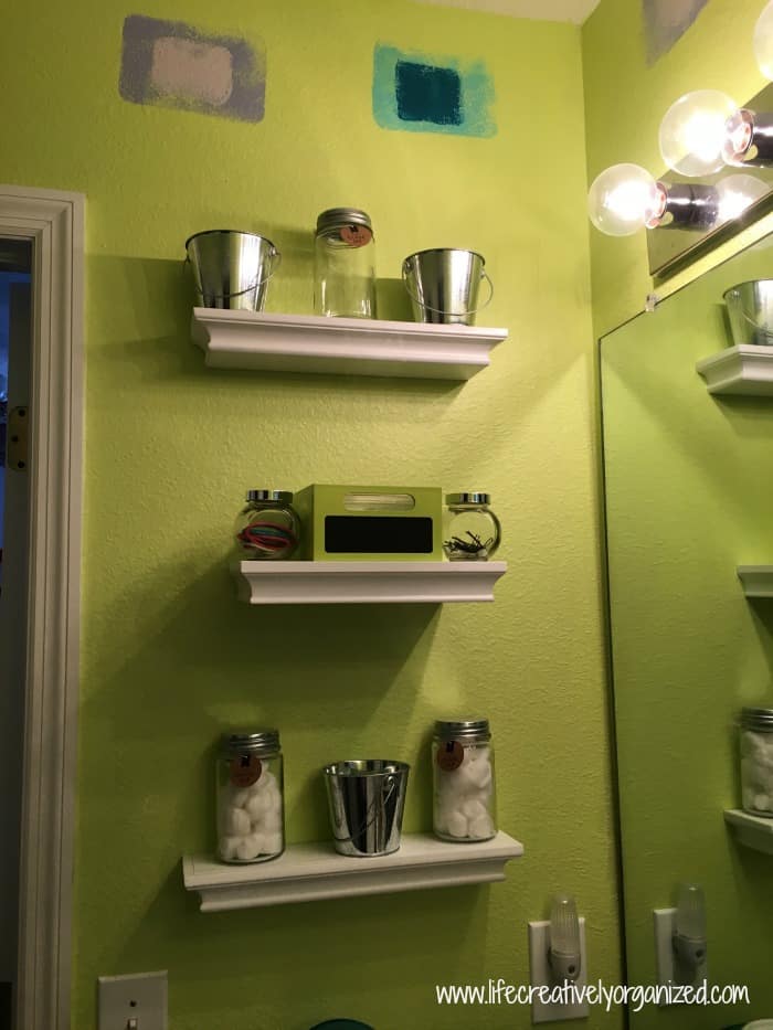 Kids’ bathroom makeover – adding shelving to bathroom wall.