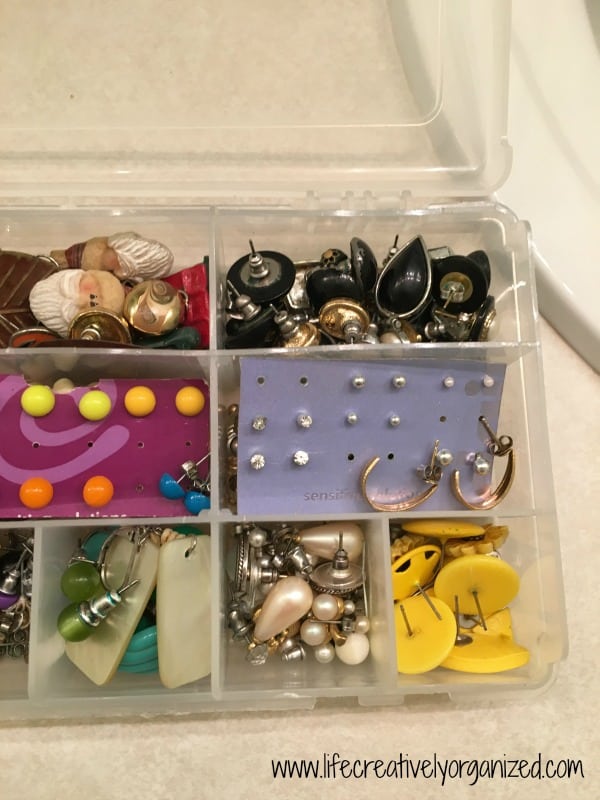 Easy way to organize earrings. Here is a great way to organize hundreds of pairs of earrings, and it stores neatly on a shelf or in a drawer. A tackle box.
